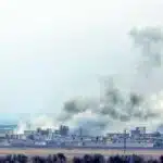 دخان بعد قصف تركي على مواقع لحزب العمال الكردستاني في تل رفعت شمالي حلب (24/11/2022/Getty)